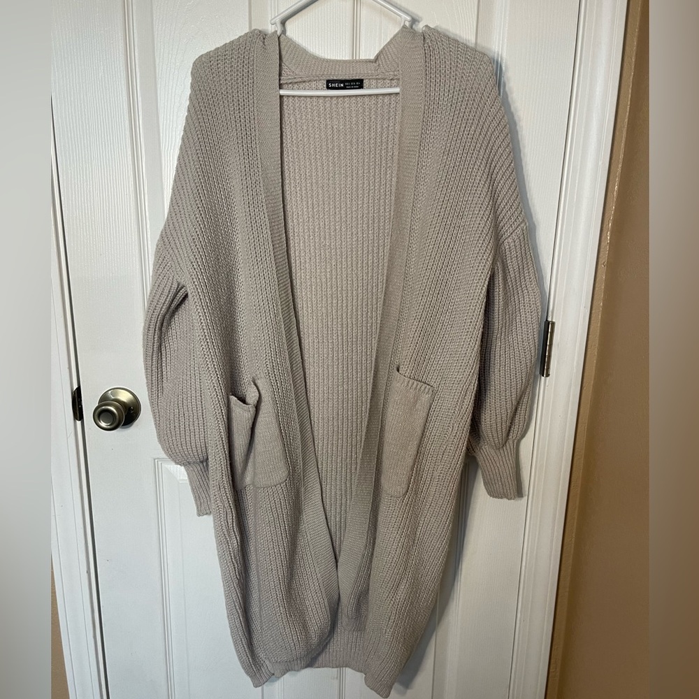 SHEIN knitted long sleeve sweater with pockets on front. In size small